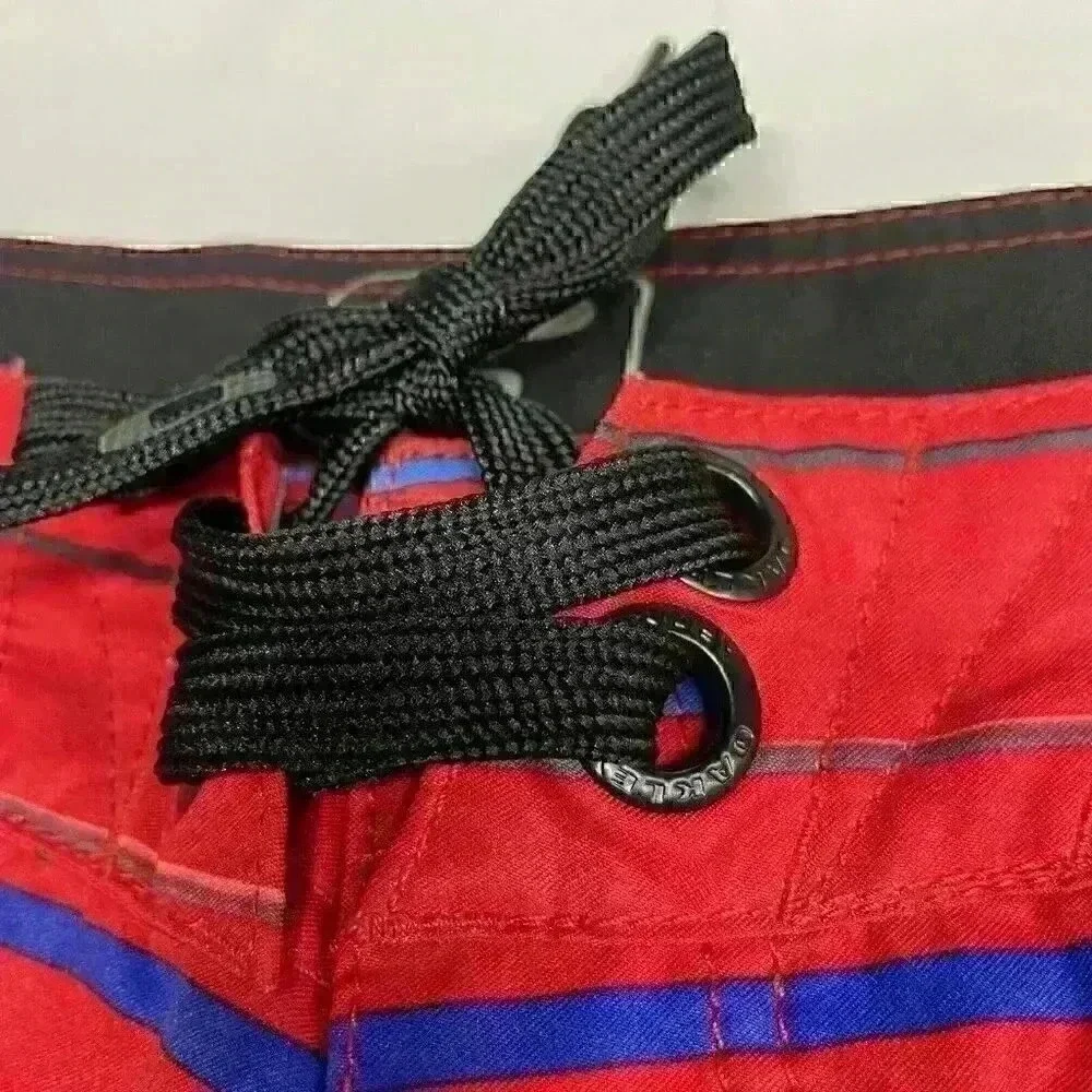 Oakley Board Shorts Men Size 32 Rainbow Stripe Performance Swim Trunks EUC‎